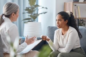 woman talking with therapist about what is seasonal depression