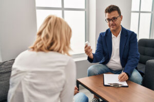 client and psychiatrist discuss medication management in worcester ma