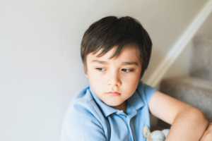 Child thinking about bipolar disorder in children