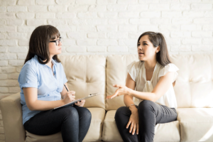 Two people talking about the benefits of medication management