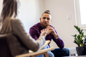 Two people talking about mental health counseling in Haverhill